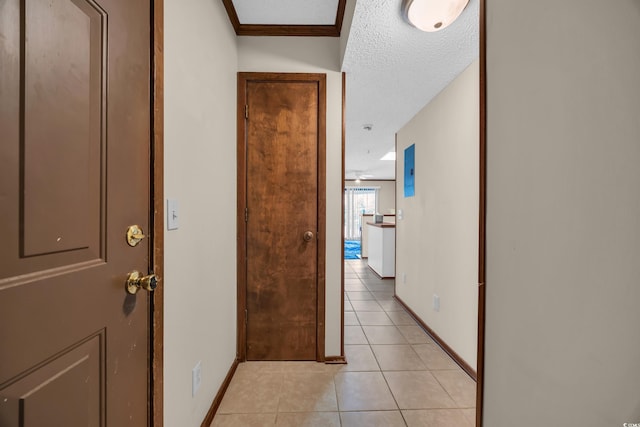 4350 Intercoastal Dr Unit 2402, Little River, SC 29566 - corridor with light tile patterned floors and a textured ceiling