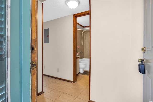 4350 Intercoastal Dr Unit 2402, Little River, SC 29566 - hall with electric panel, light tile patterned floors, and a textured ceiling