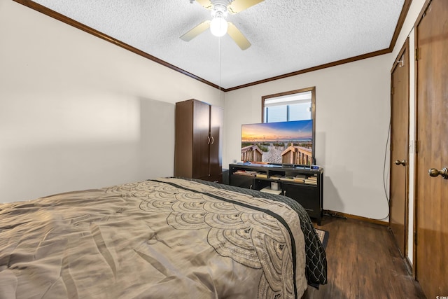 4350 Intercoastal Dr Unit 2402, Little River, SC 29566 - bedroom with a textured ceiling, ornamental molding, dark wood-style flooring, and a ceiling fan