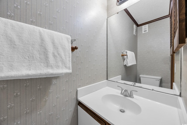 4350 Intercoastal Dr Unit 2402, Little River, SC 29566 - half bathroom featuring crown molding, vanity, and wallpapered walls