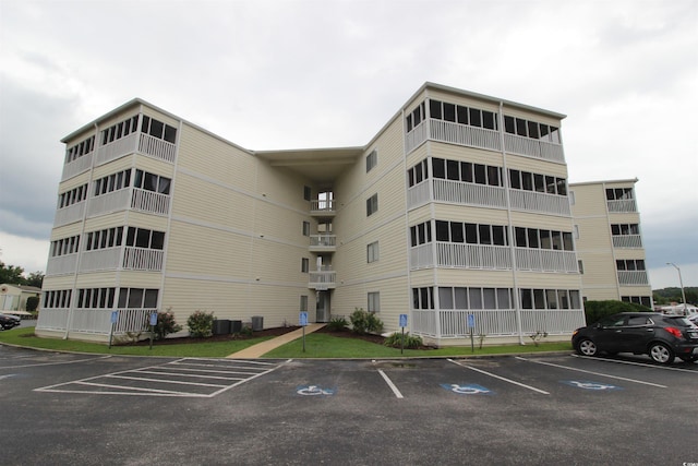 4350 Intercoastal Dr Unit 2402, Little River, SC 29566 - view of building exterior featuring uncovered parking