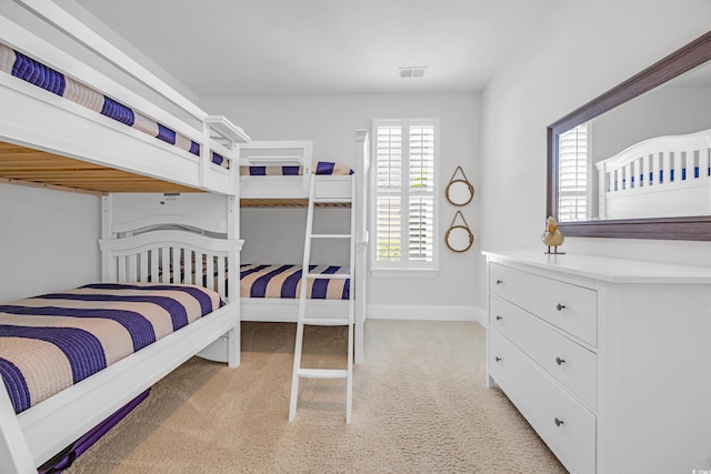7202 Seville Dr, Myrtle Beach, SC 29572 - bedroom featuring light colored carpet and baseboards