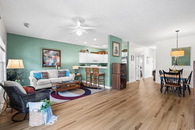 1058 Sea Mountain Hwy Unit 9-101, North Myrtle Beach, SC 29582 - living area with a ceiling fan and light wood-style floors