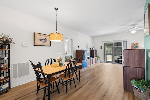 1058 Sea Mountain Hwy Unit 9-101, North Myrtle Beach, SC 29582 - dining area featuring wood finished floors and ceiling fan