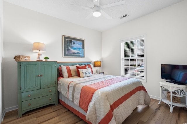 1058 Sea Mountain Hwy Unit 9-101, North Myrtle Beach, SC 29582 - bedroom featuring light wood-style floors and ceiling fan
