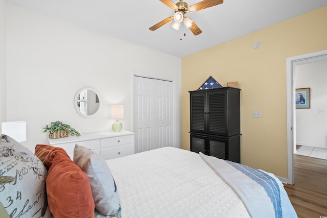 1058 Sea Mountain Hwy Unit 9-101, North Myrtle Beach, SC 29582 - bedroom featuring wood finished floors, a closet, and a ceiling fan