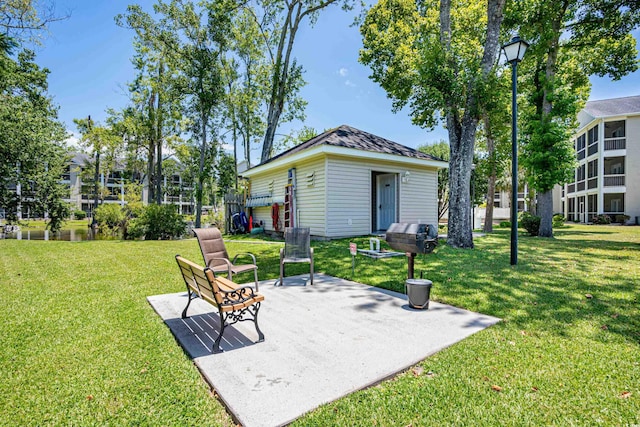 1058 Sea Mountain Hwy Unit 9-101, North Myrtle Beach, SC 29582 - view of green lawn with a patio