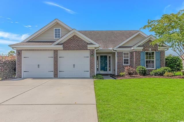 5 Coffee Mill Creek Ln, Carolina Shores, NC 28467 - view of front of house with brick siding, driveway, a front lawn, roof with shingles, and an attached garage