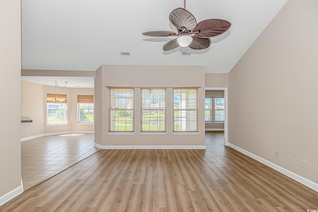 5 Coffee Mill Creek Ln, Carolina Shores, NC 28467 - unfurnished living room with plenty of natural light, ceiling fan, baseboards, and light wood-style flooring