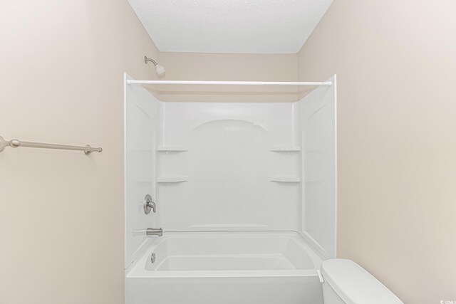 5 Coffee Mill Creek Ln, Carolina Shores, NC 28467 - full bathroom with toilet, a textured ceiling, and  shower combination