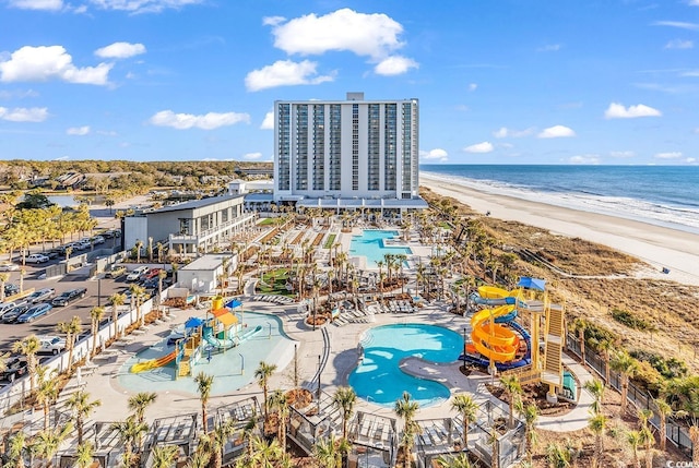 9820 Queensway Blvd Unit 804, Myrtle Beach, SC 29572 - drone / aerial view of a pool area and expansive coastline