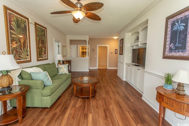 2241 Waterview Dr Unit 315, North Myrtle Beach, SC 29582 - living area featuring a textured ceiling, a ceiling fan, dark wood-style flooring, ornamental molding, and baseboards