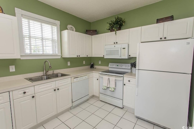 2241 Waterview Dr Unit 315, North Myrtle Beach, SC 29582 - kitchen featuring white appliances, a sink, white cabinetry, and light countertops