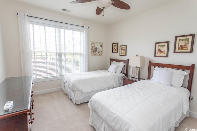2241 Waterview Dr Unit 315, North Myrtle Beach, SC 29582 - bedroom with light colored carpet, baseboards, and a ceiling fan