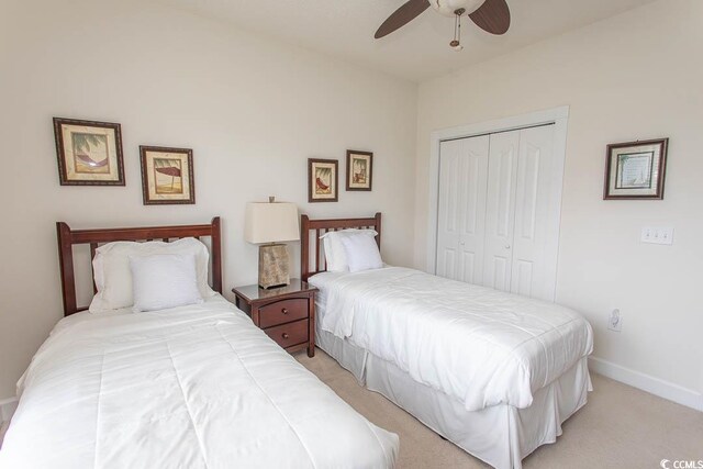 2241 Waterview Dr Unit 315, North Myrtle Beach, SC 29582 - bedroom featuring a closet, carpet floors, baseboards, and a ceiling fan