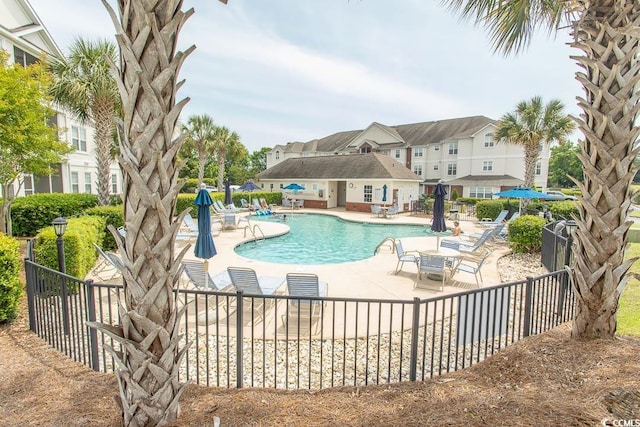 2241 Waterview Dr Unit 315, North Myrtle Beach, SC 29582 - community pool featuring a patio area and fence