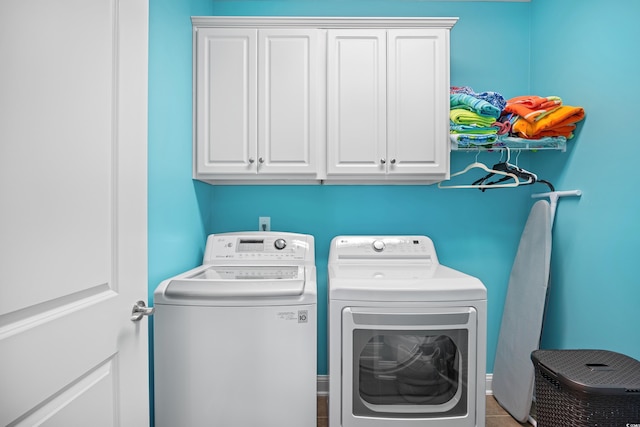 1290 Prescott Cir, Myrtle Beach, SC 29577 - washroom with washing machine and clothes dryer and cabinet space