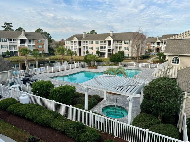 3761 Citation Way Unit 531, Myrtle Beach, SC 29577 - community pool featuring a community hot tub, a residential view, and a pergola