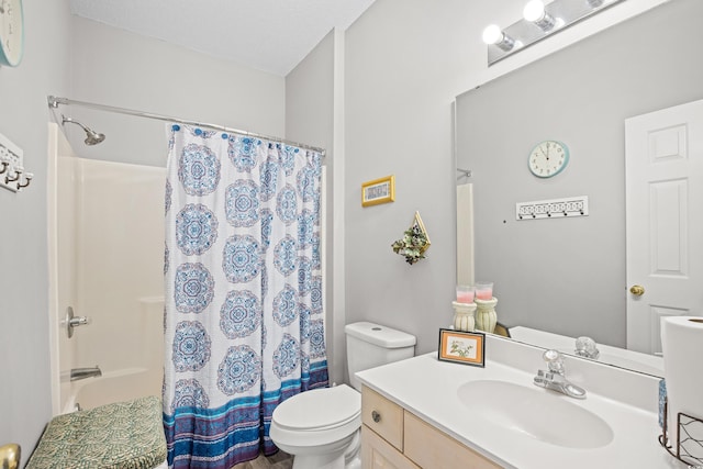 full bath featuring toilet, a shower with curtain, and vanity
