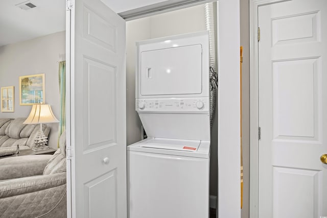 laundry area featuring estacked washer and dryer