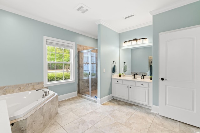full bathroom featuring ornamental molding, a shower stall, vanity, a garden tub, and tile patterned flooring