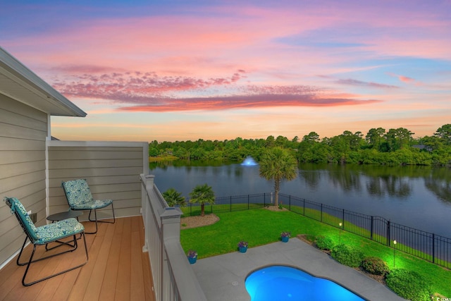 view of pool featuring a water view