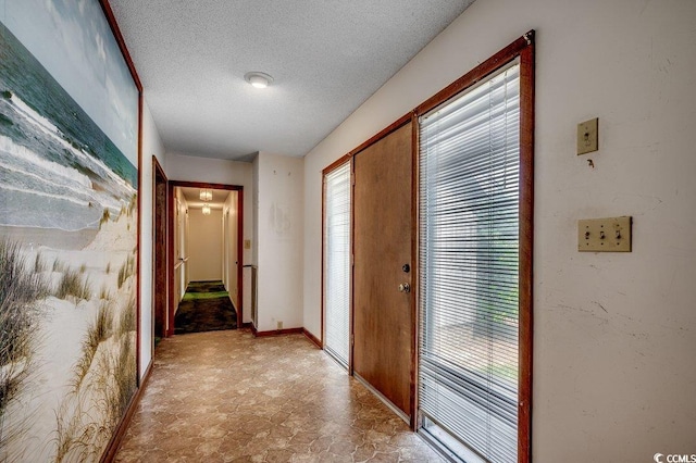2010 Ye Olde Kings Hwy, North Myrtle Beach, SC 29582 - corridor featuring a textured ceiling and plenty of natural light