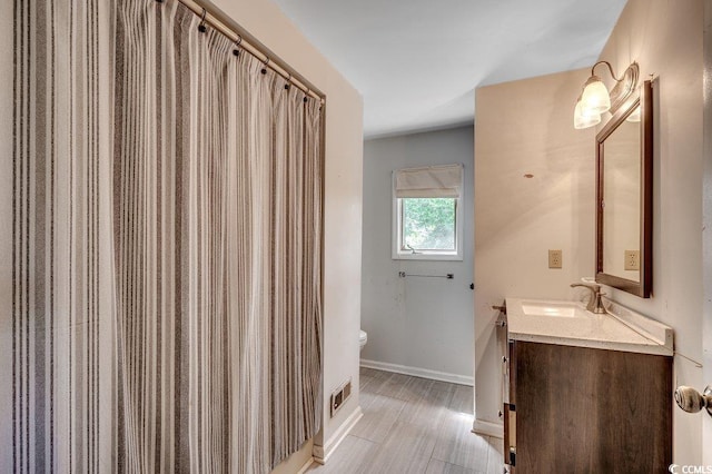 2010 Ye Olde Kings Hwy, North Myrtle Beach, SC 29582 - full bath with toilet, vanity, and baseboards