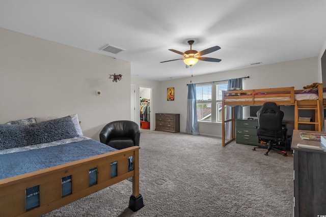 3620 Diamond Stars Way, Little River, SC 29566 - bedroom featuring an office area, carpet flooring, ceiling fan, and a walk in closet