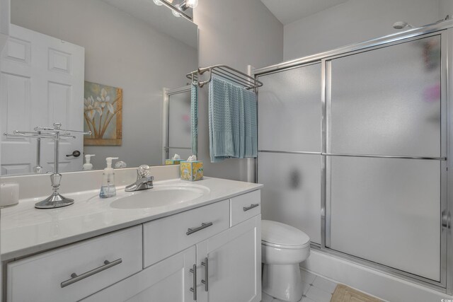 4450 Turtle Ln Unit 2-A, Little River, SC 29566 - full bathroom featuring a stall shower, toilet, and vanity