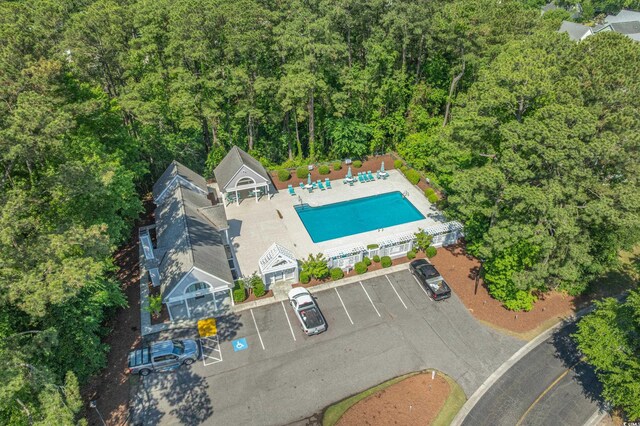 4450 Turtle Ln Unit 2-A, Little River, SC 29566 - bird's eye view of a pool and a forest