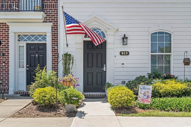 815 Murray Ave, Myrtle Beach, SC 29577 - entrance to property featuring brick siding and a balcony