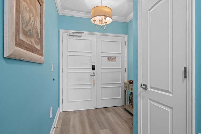 100 N Beach Blvd Unit 515, North Myrtle Beach, SC 29582 - foyer entrance featuring ornamental molding, a chandelier, and wood finished floors