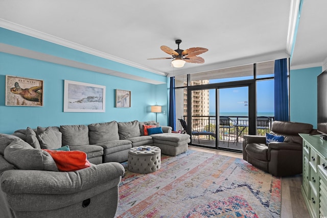 100 N Beach Blvd Unit 515, North Myrtle Beach, SC 29582 - living area featuring crown molding, wood finished floors, ceiling fan, and expansive windows
