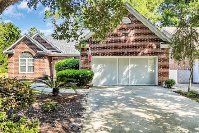 3071 Alice Ln, Little River, SC 29566 - view of front of property featuring brick siding, concrete driveway, a shingled roof, and an attached garage