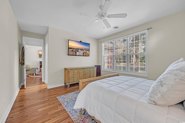 3071 Alice Ln, Little River, SC 29566 - bedroom featuring light wood-style floors, baseboards, and ceiling fan