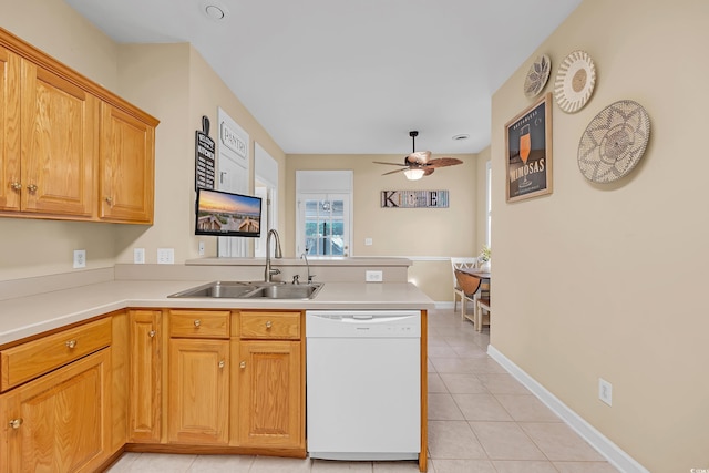 3071 Alice Ln, Little River, SC 29566 - kitchen featuring white dishwasher, a peninsula, light tile patterned flooring, a ceiling fan, and light countertops