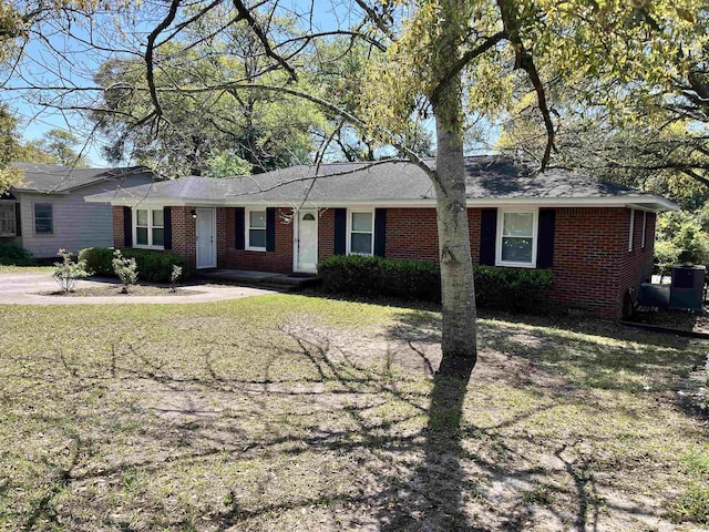 505 1st Ave S, North Myrtle Beach, SC 29582 - single story home with brick siding and a front yard