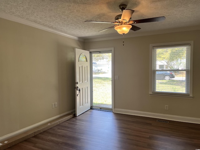 505 1st Ave S, North Myrtle Beach, SC 29582 - entrance foyer featuring dark wood finished floors, a textured ceiling, ceiling fan, baseboards, and crown molding