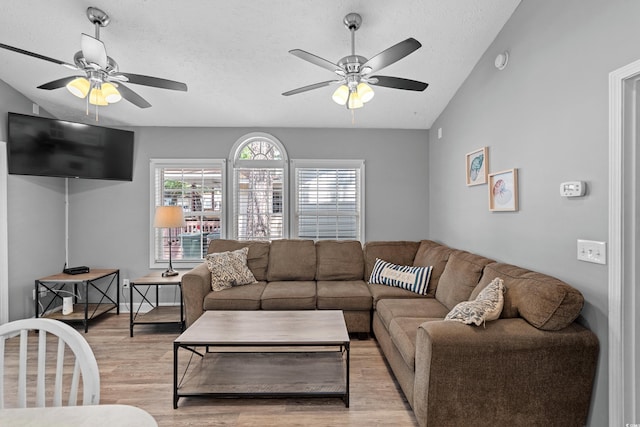 6001-1732 S Kings Hwy, Myrtle Beach, SC 29575 - living room featuring ceiling fan, wood finished floors, a textured ceiling, and vaulted ceiling