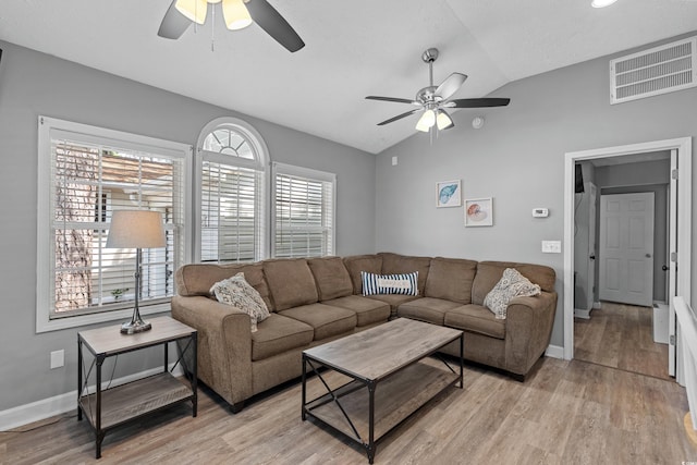 6001-1732 S Kings Hwy, Myrtle Beach, SC 29575 - living area featuring ceiling fan, lofted ceiling, light wood-type flooring, and baseboards