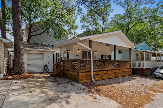 6001-1732 S Kings Hwy, Myrtle Beach, SC 29575 - view of front of house with a deck, driveway, a ceiling fan, and a garage