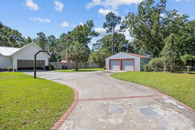 62 Warbler St, Georgetown, SC 29440 - view of yard featuring a garage and an outdoor structure