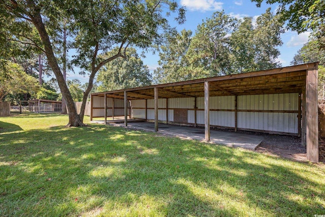 62 Warbler St, Georgetown, SC 29440 - view of yard with an outbuilding and a detached carport