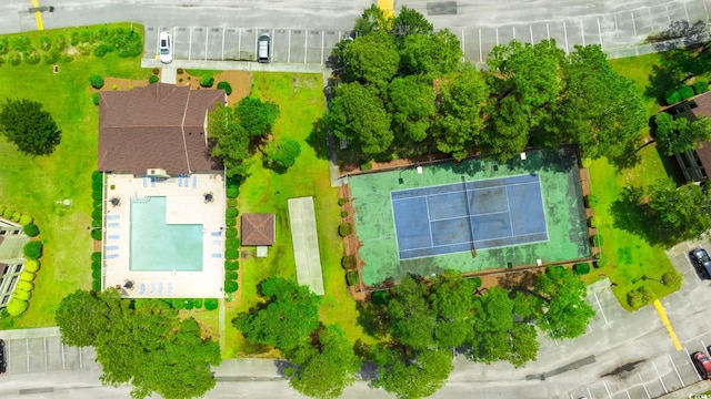 aerial view of property's location featuring a pool and property boundaries highlighted
