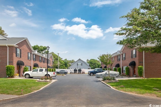 404 1st Ave N Unit H, North Myrtle Beach, SC 29582 - view of asphalt street featuring street lighting and a residential view