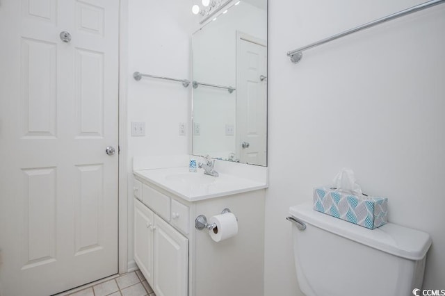 404 1st Ave N Unit H, North Myrtle Beach, SC 29582 - bathroom with vanity, toilet, and tile patterned floors