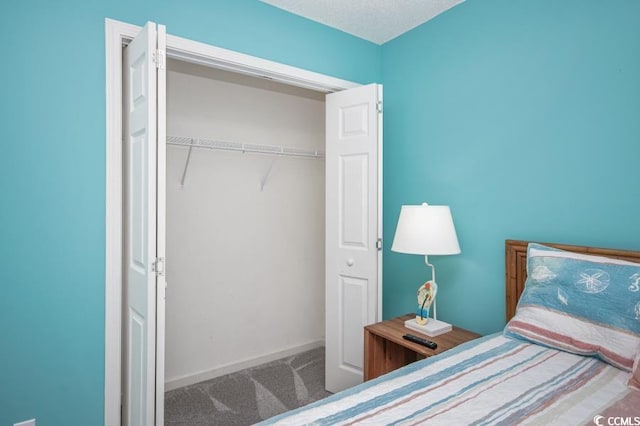 404 1st Ave N Unit H, North Myrtle Beach, SC 29582 - carpeted bedroom featuring a closet and baseboards