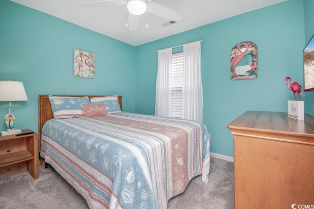 404 1st Ave N Unit H, North Myrtle Beach, SC 29582 - carpeted bedroom with a ceiling fan and baseboards