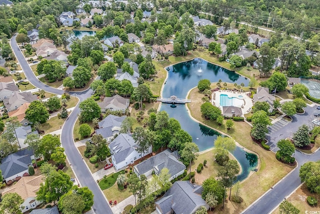 67 Camden Cir, Pawleys Island, SC 29585 - aerial perspective of suburban area featuring a pool area and a large body of water